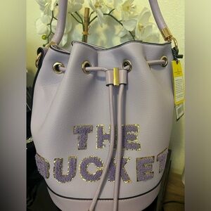 Purple and Gold Shoulder Bag with Drawstring Design
